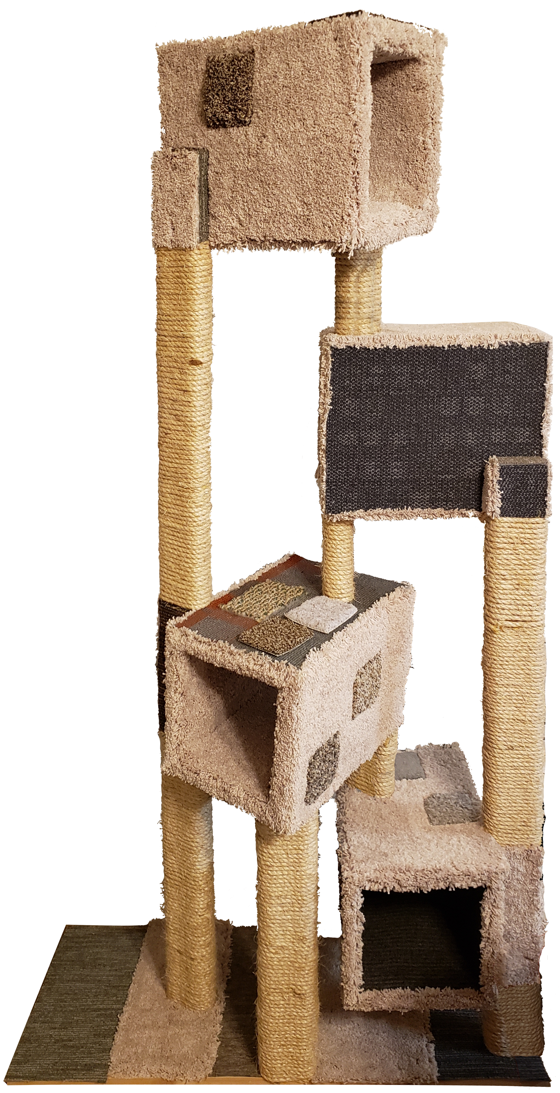 A cat tower consisting of 4 boxes covered in different patches of carpet, facing different directions at different heights, supported by beams wrapped in rope.